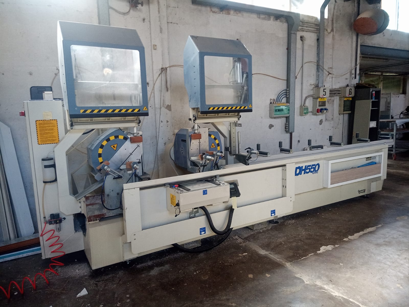 Troncatrice CNC doppia testa AUDATECH DH550 usata in vendita - foto 1