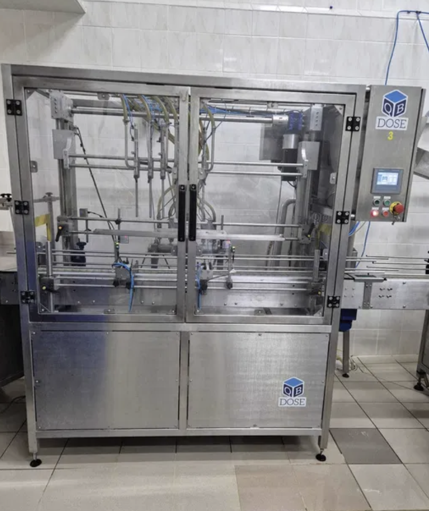 Linea di riempimento e tappatura bottiglie  a 2000 ml in vendita - foto 1