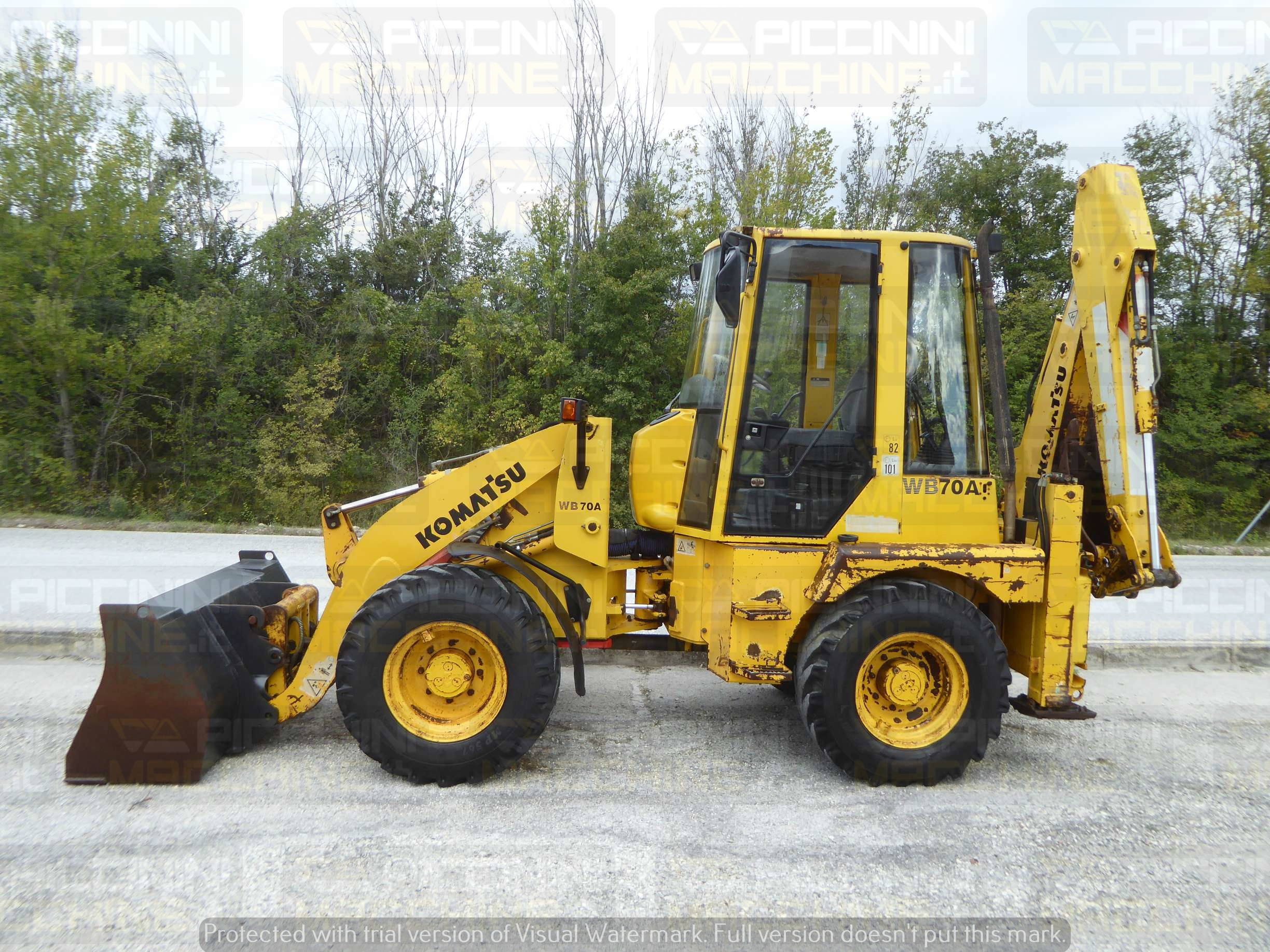 Terna articolata Komatsu WB70A in vendita - foto 1