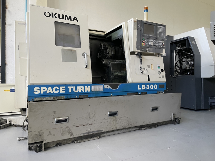 TORNIO CNC USATO OKUMA LB 300 in vendita - foto 1