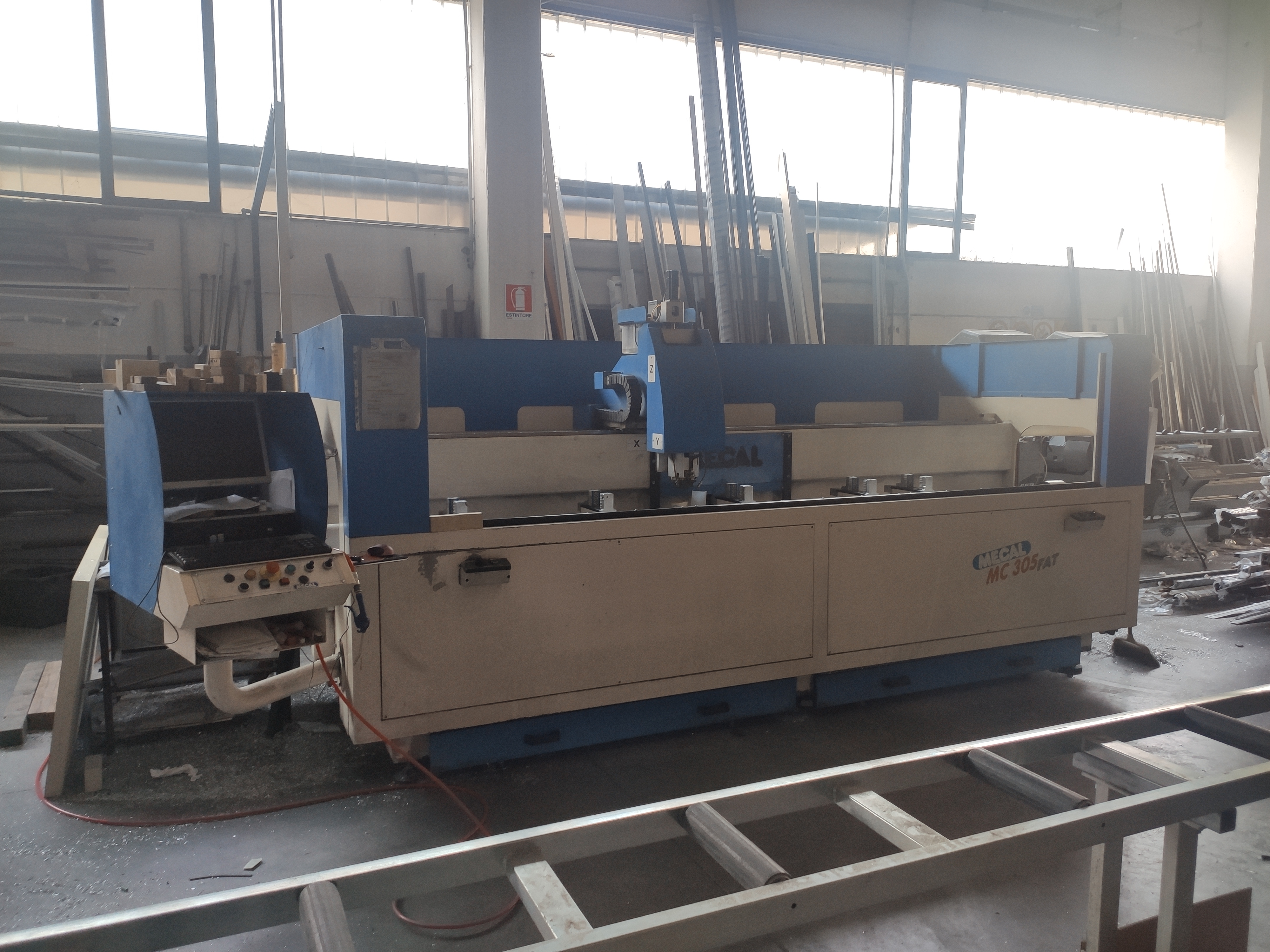 CENTRO DI LAVORO 4 ASSI MECAL MC 305 FAT TM in vendita - foto 1
