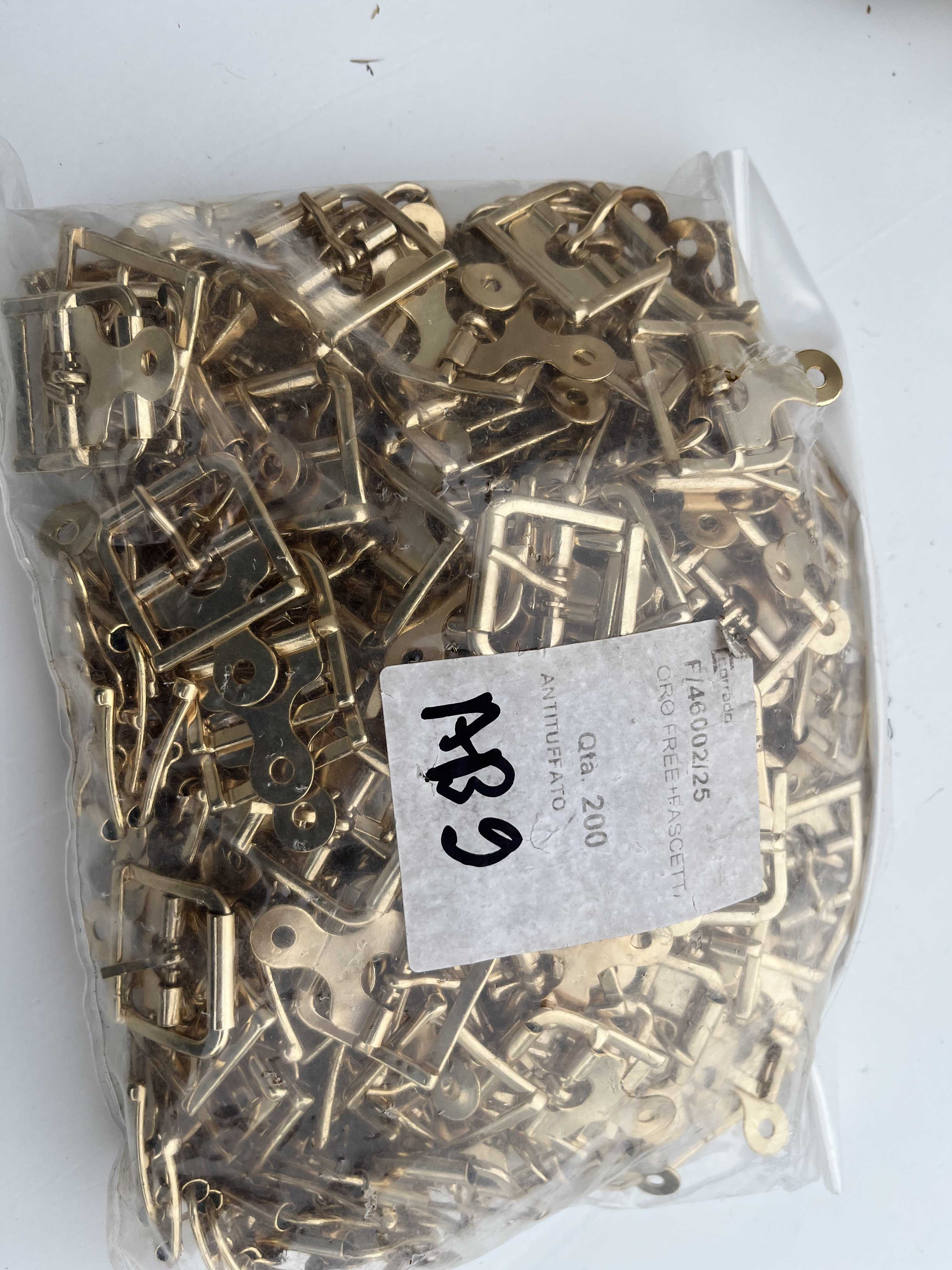 Stock Fibbie a rivetto metallo oro da 25 mm – Pz. 1.000 in vendita - foto 3