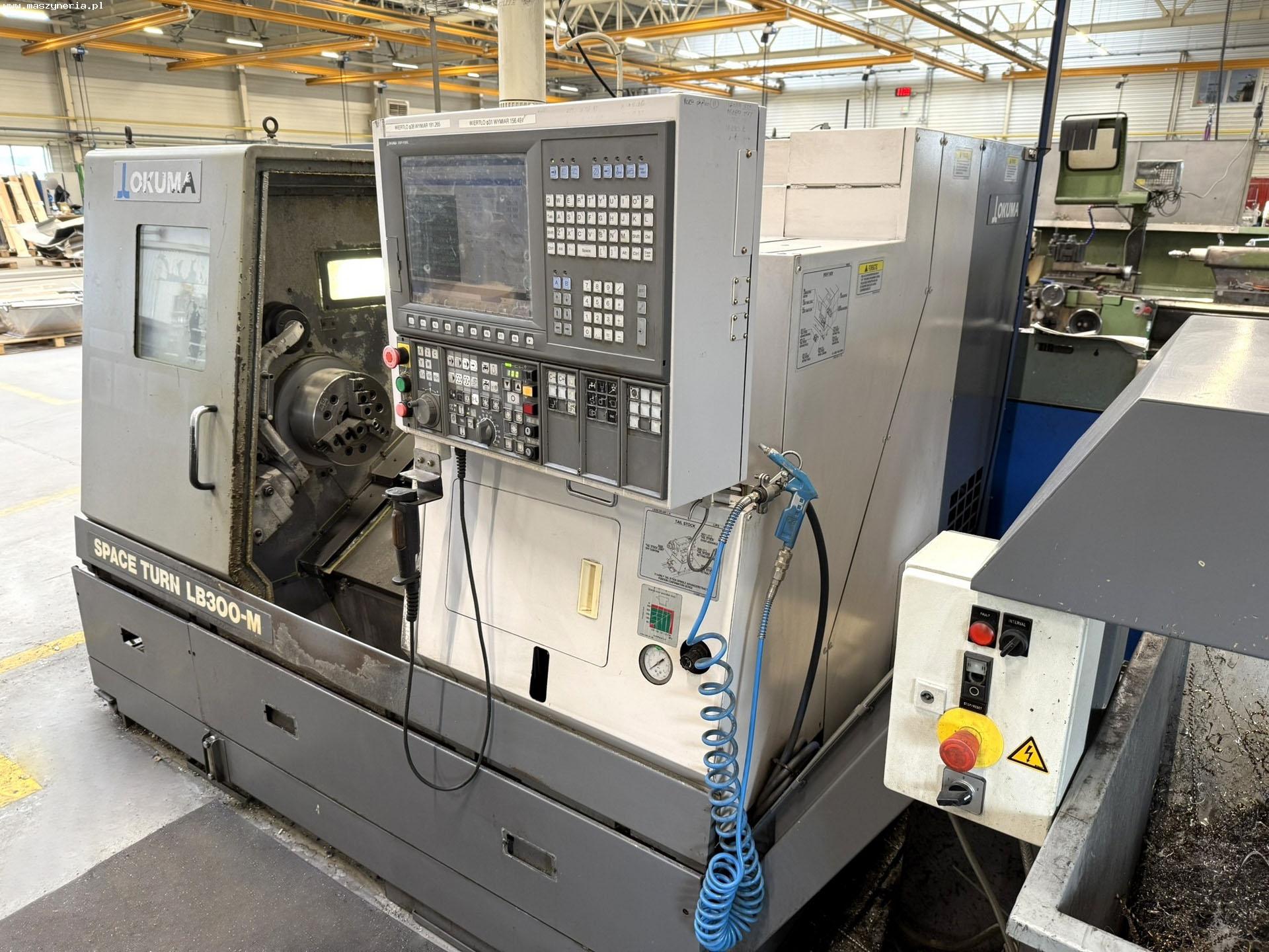 Centro di tornitura CNC OKUMA LB 300 M in vendita - foto 1