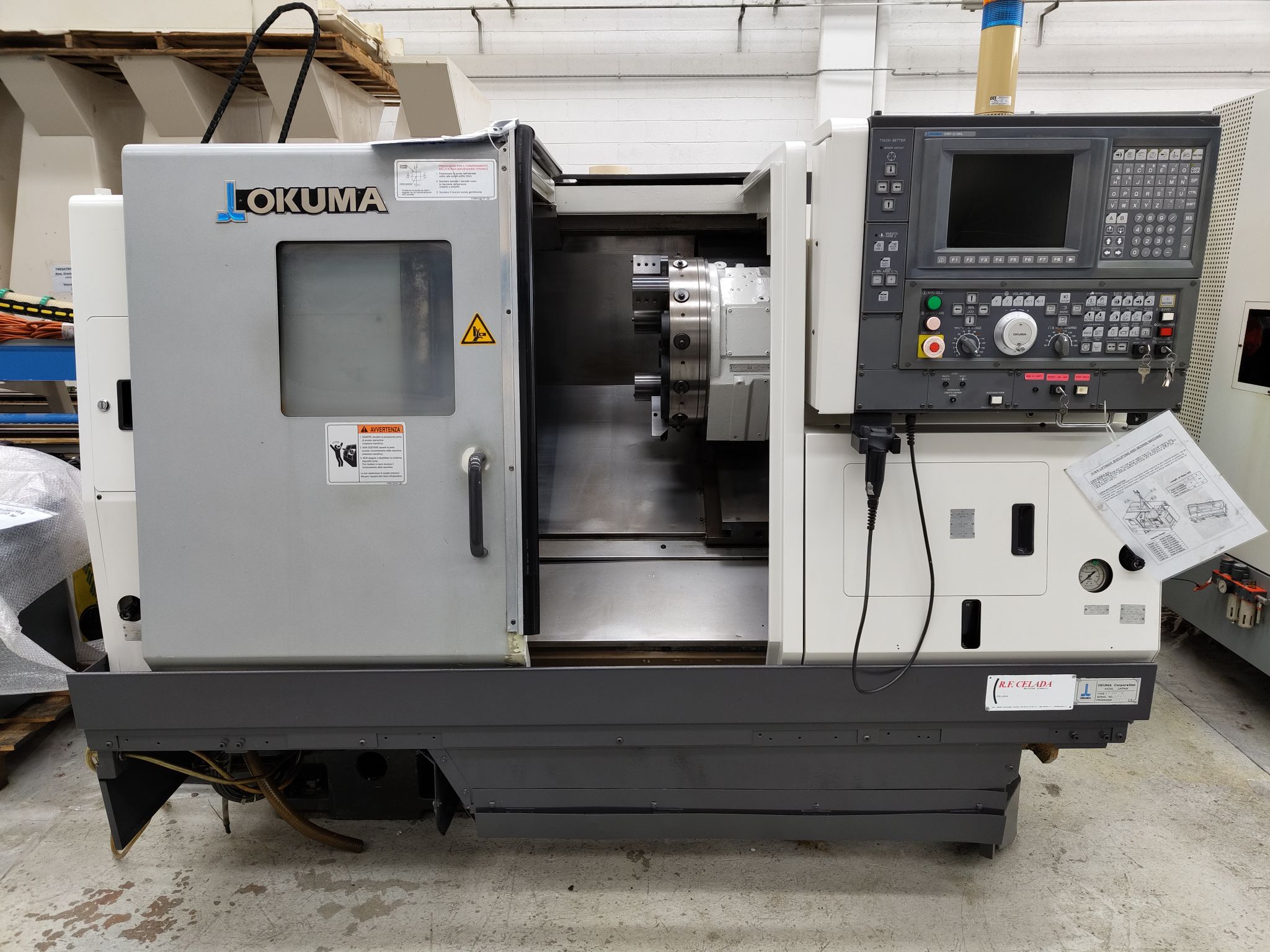 Tornio CNC usato OKUMA LB 300 M in vendita - foto 1